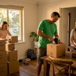 Family packing moving boxes in Perth living room